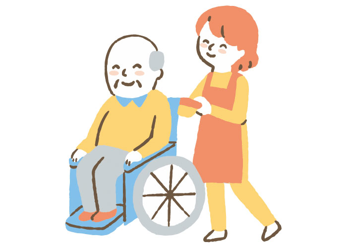 車椅子に乗る高齢者を介助する女性